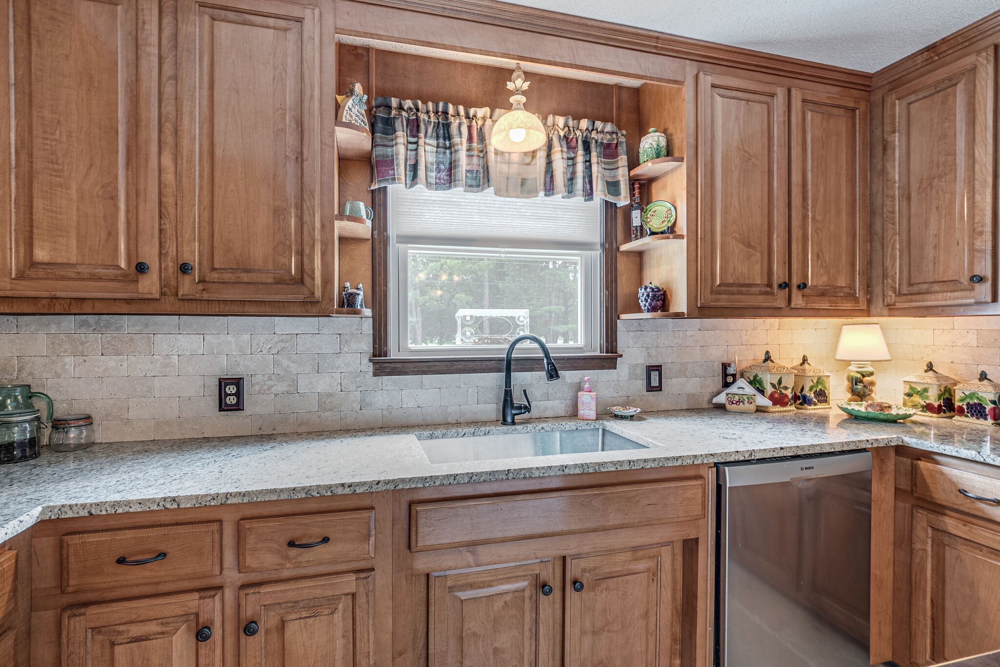 2770 Ben Green Road Lebanon, TN 37090 - Photo 14 of 37 a kitchen with granite countertop a sink stainless steel appliances and cabinets
