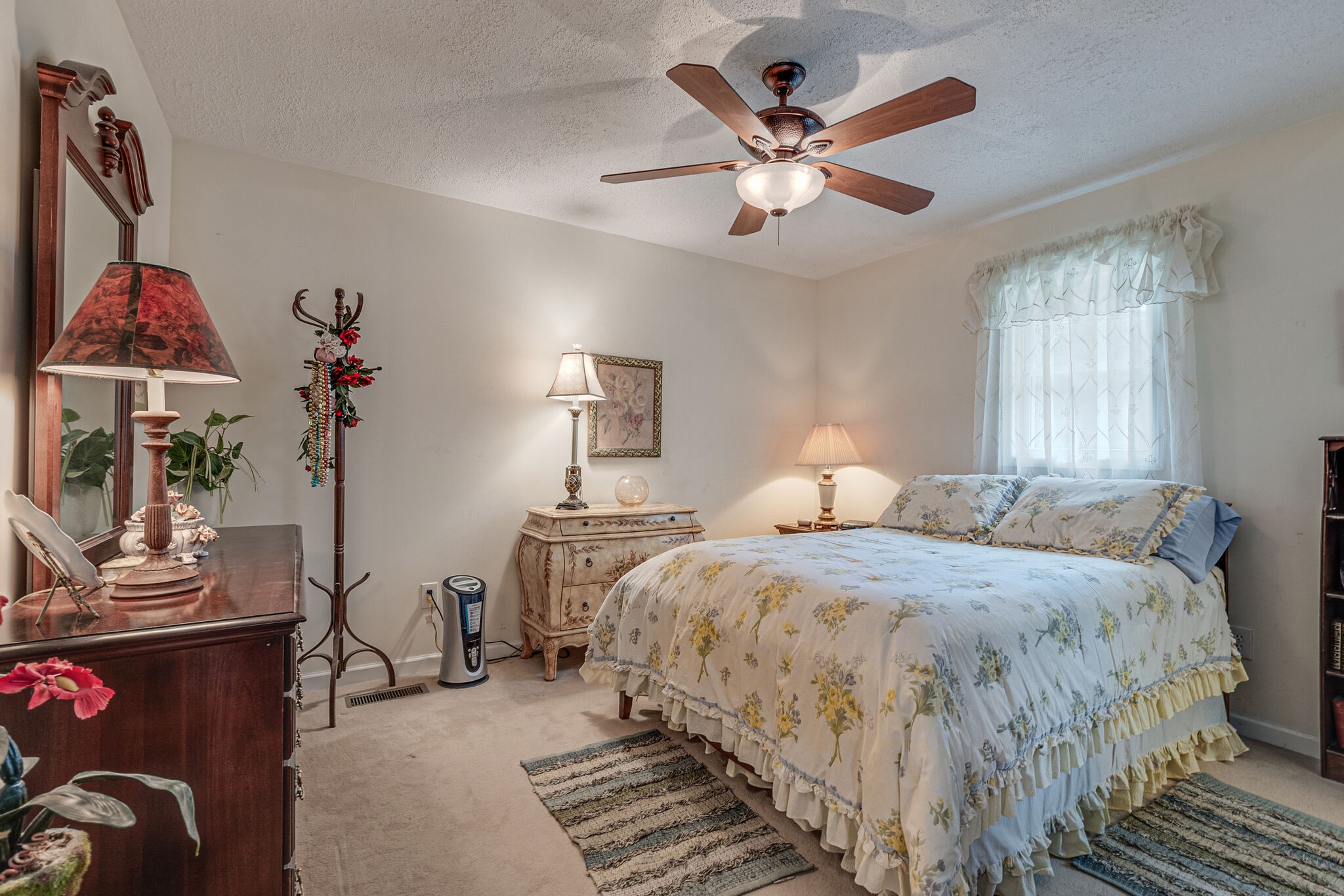 2770 Ben Green Road Lebanon, TN 37090 - Photo 30 of 37 a bedroom with a bed and a chandelier