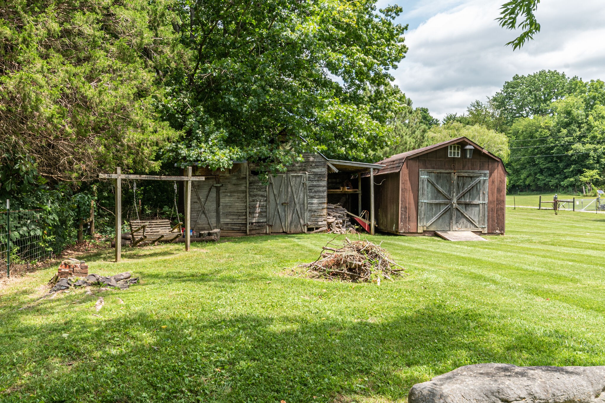 2770 Ben Green Road Lebanon, TN 37090 - Photo 36 of 37 a backyard of a house with table and chairs and potted plants