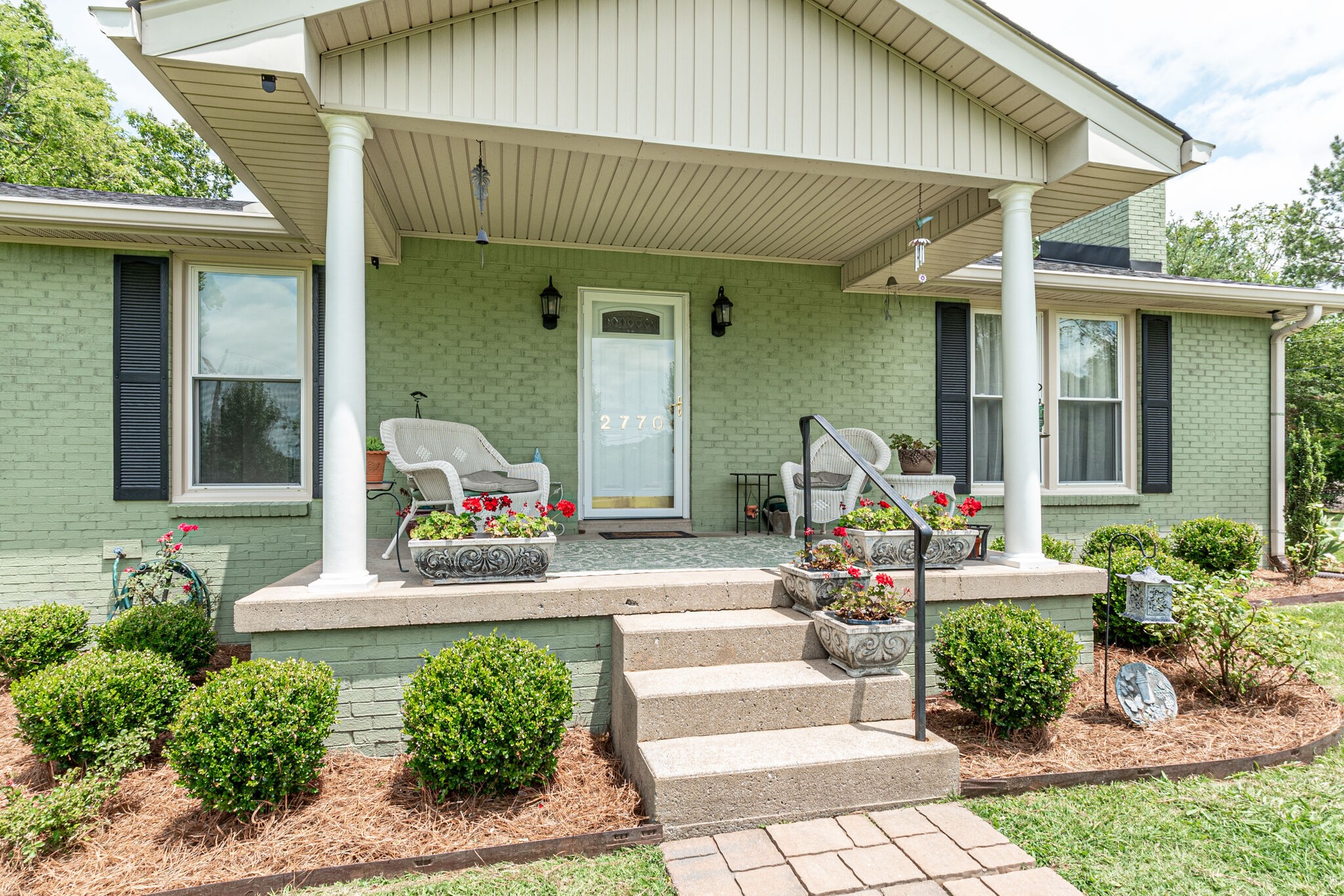 2770 Ben Green Road Lebanon, TN 37090 - Photo 5 of 37 a front view of a house with garden