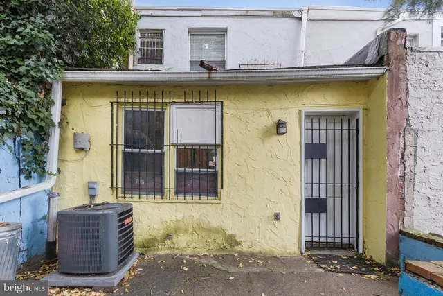 a front view of a house with a outdoor space