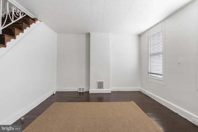 a view of a room with a window