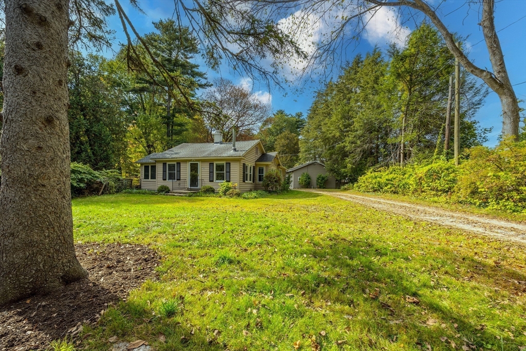 763 Stony Hill Road Wilbraham, MA 01095 - Photo 30 of 30 a front view of house with yard and green space