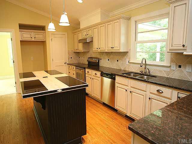 4300 Windsor Place Raleigh, NC 27609 - Photo 2 of 8 Gorgeous new kitchen...everything new! NEW cabintes, granite counters, appliances, island.