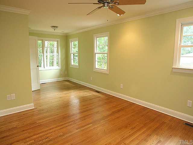 4300 Windsor Place Raleigh, NC 27609 - Photo 4 of 8 New master with hardwood floors and sitting area.