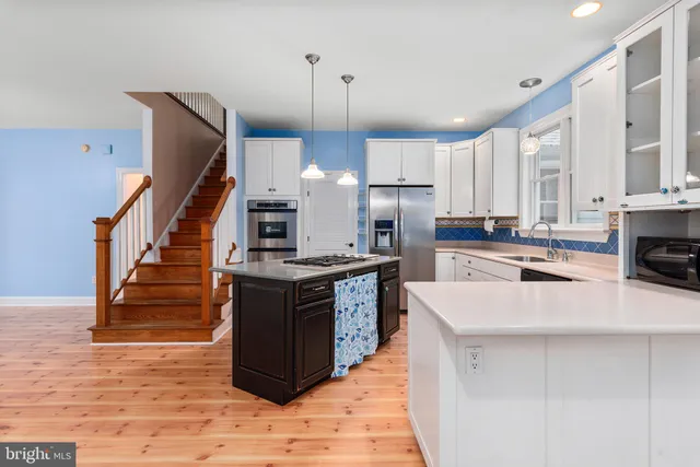 a view of a hallway with staircase