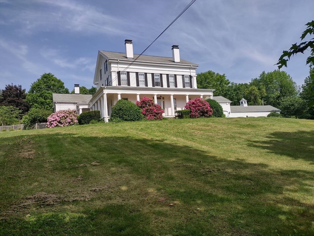 1341 Hardwick Road Hardwick, MA 01037 - Photo 2 of 27 a view of a house with a big yard