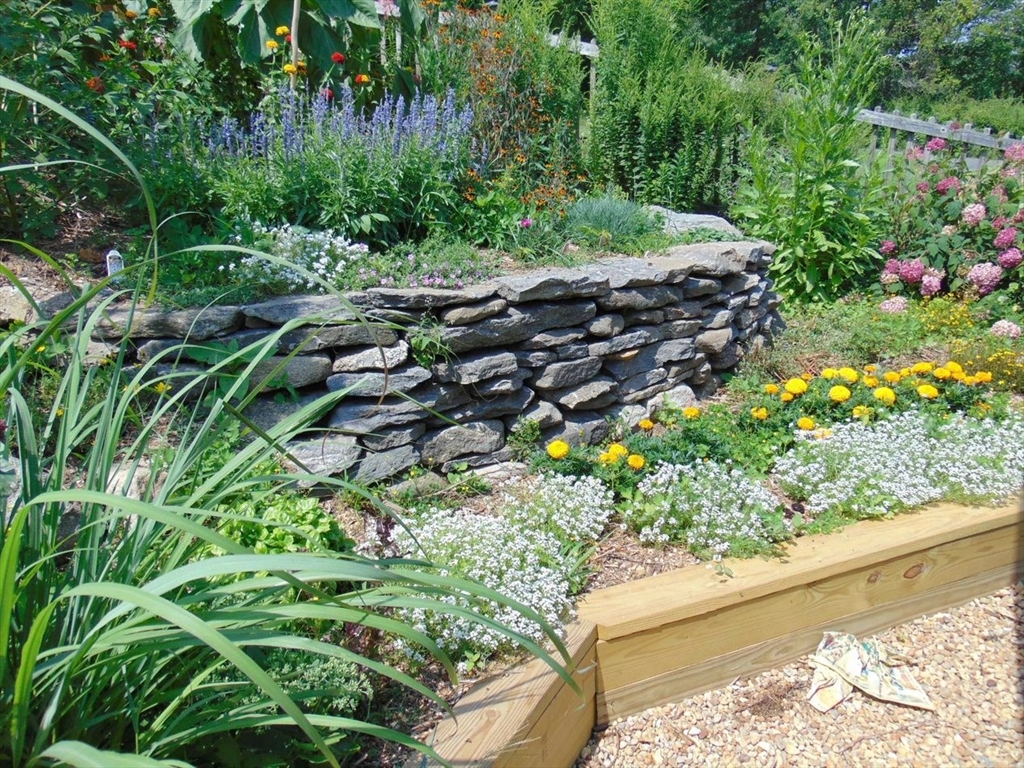 1341 Hardwick Road Hardwick, MA 01037 - Photo 25 of 27 a garden with lots of trees and flowers