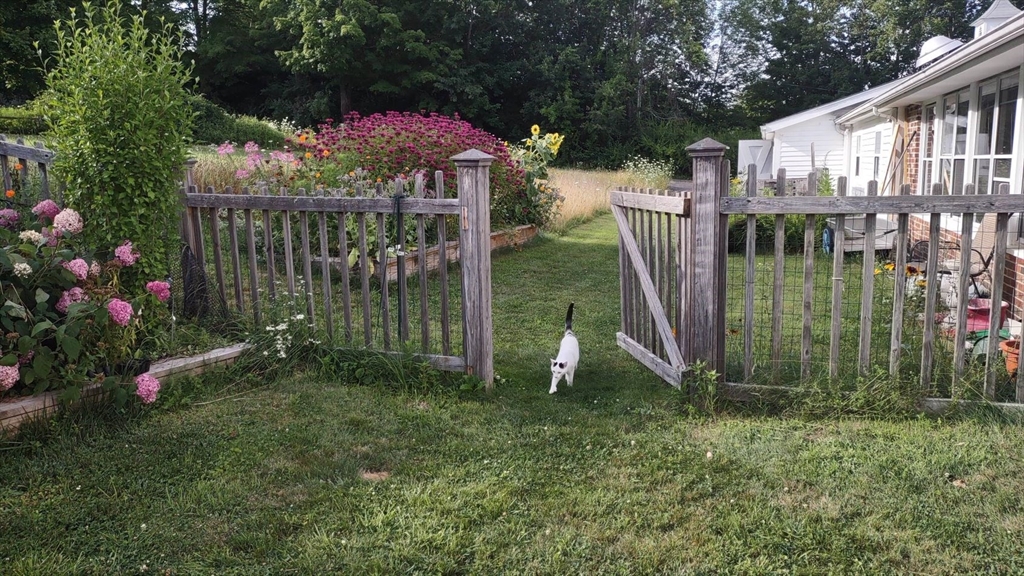 1341 Hardwick Road Hardwick, MA 01037 - Photo 27 of 27 a view of a house with a backyard and garden