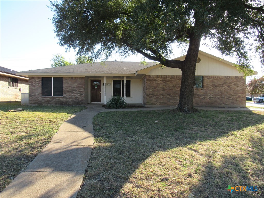 1325 Paseo Del Cobre Temple, TX 76502 - Photo 1 of 15 front view of a house with a yard