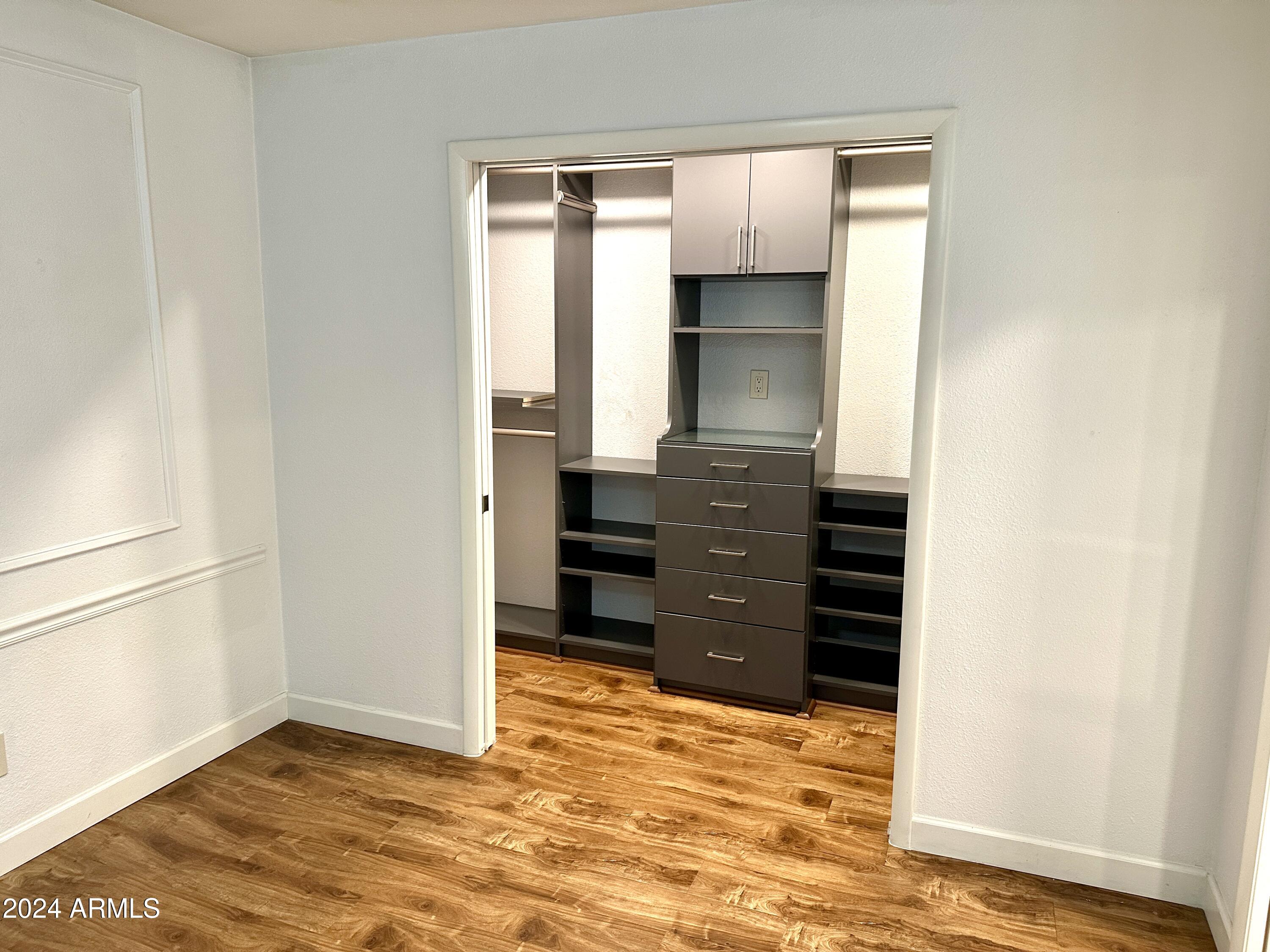 2510 North 22nd Drive Phoenix, AZ 85009 - Photo 18 of 37 Primary closet with organizer