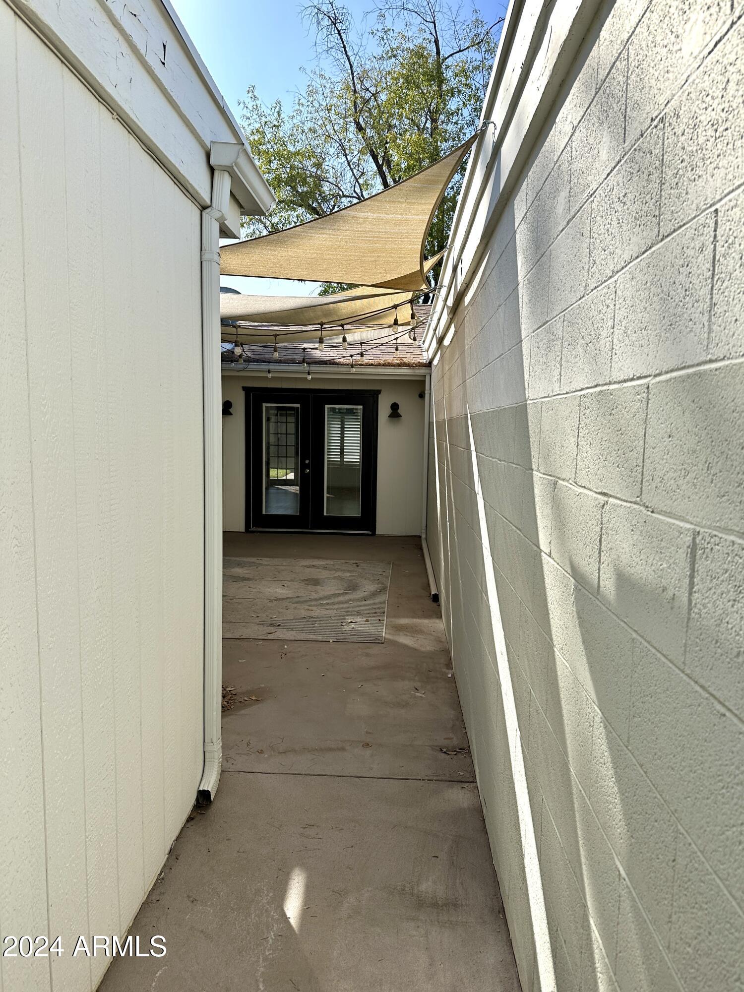 2510 North 22nd Drive Phoenix, AZ 85009 - Photo 34 of 37 Walk into the private counrtyard