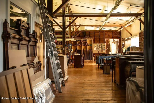 a view of a chairs with wooden floor