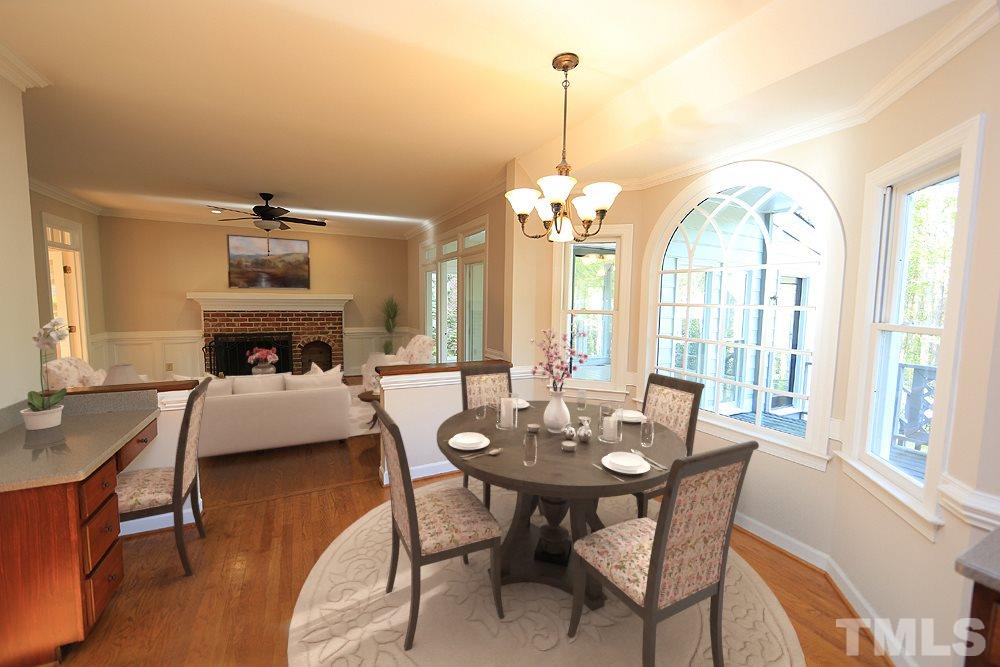 7809 Ketley Court Raleigh, NC 27615 - Photo 11 of 30 Enjoy a meal with the sun shining in through the Bay window.