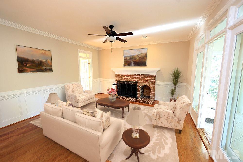 7809 Ketley Court Raleigh, NC 27615 - Photo 12 of 30 This Family Room is conveniently open to the Kitchen as well as the Sun Room.