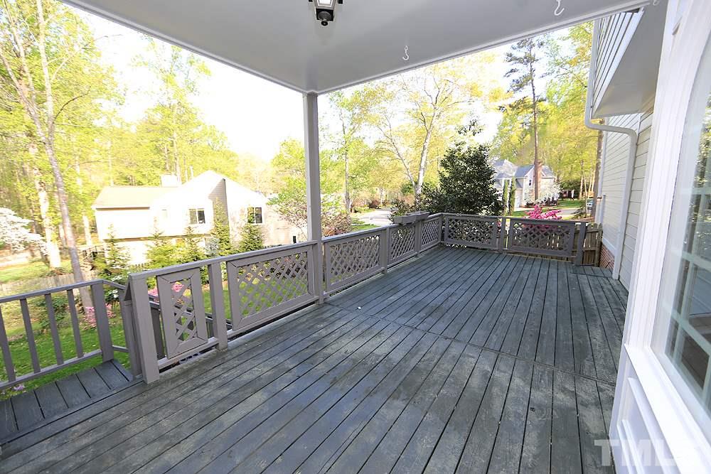 7809 Ketley Court Raleigh, NC 27615 - Photo 16 of 30 Enjoy some shade on this deck or step out into the sun.