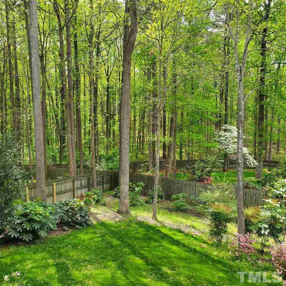 7809 Ketley Court Raleigh, NC 27615 - Photo 3 of 30 Your private, wooded back yard view- getting harder and harder to find in North Raleigh.