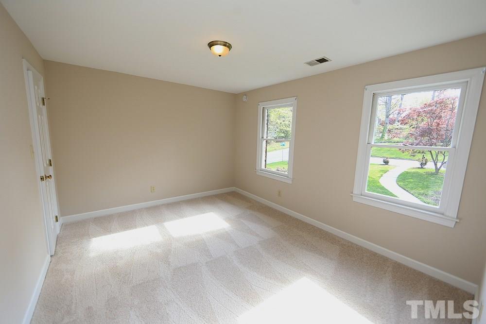 7809 Ketley Court Raleigh, NC 27615 - Photo 22 of 30 Nice size walk in closet here.