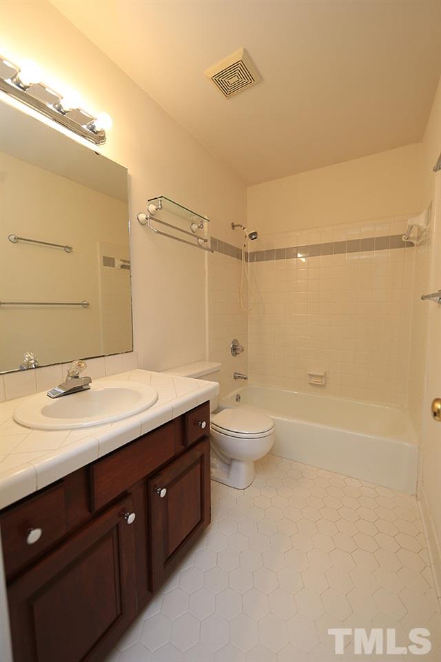 7809 Ketley Court Raleigh, NC 27615 - Photo 23 of 30 Full bath upstairs.