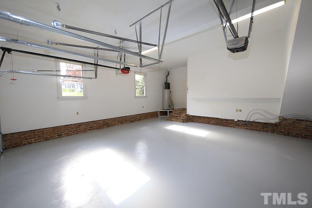 7809 Ketley Court Raleigh, NC 27615 - Photo 26 of 30 Even the garage is spotless here with new Epoxy Floor.