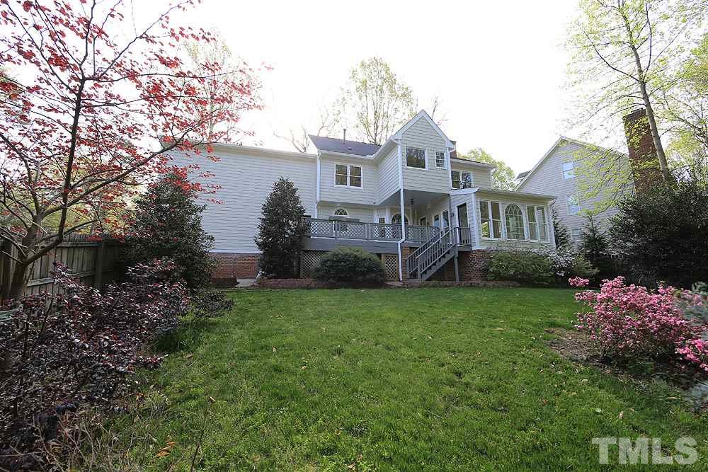 7809 Ketley Court Raleigh, NC 27615 - Photo 28 of 30 Only one family has lived in this home and cared for it well as can be seen in the mature landscaping.
