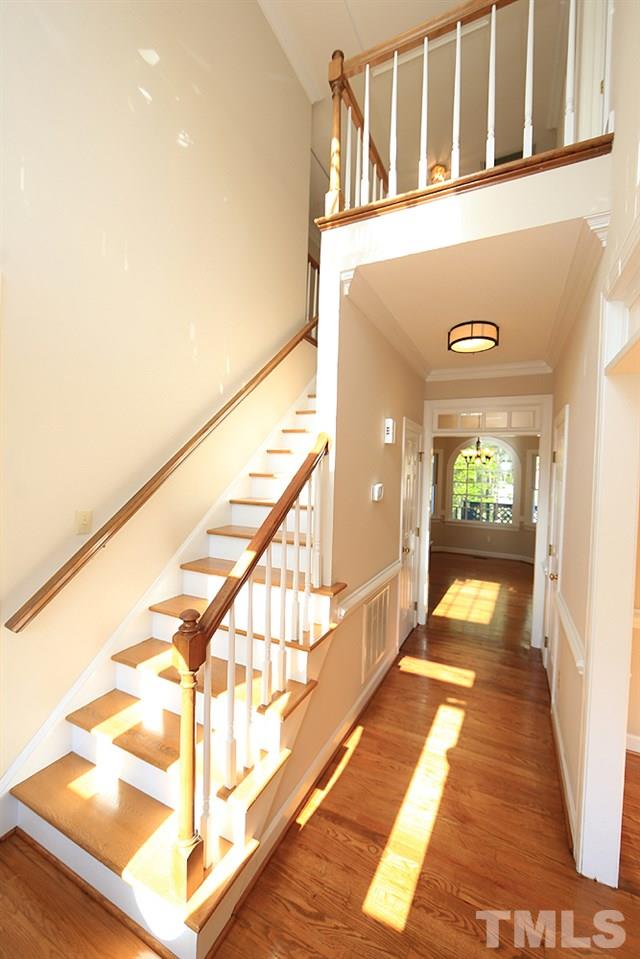7809 Ketley Court Raleigh, NC 27615 - Photo 4 of 30 As soon as you step inside, your eyes take you straight out back to all the trees!