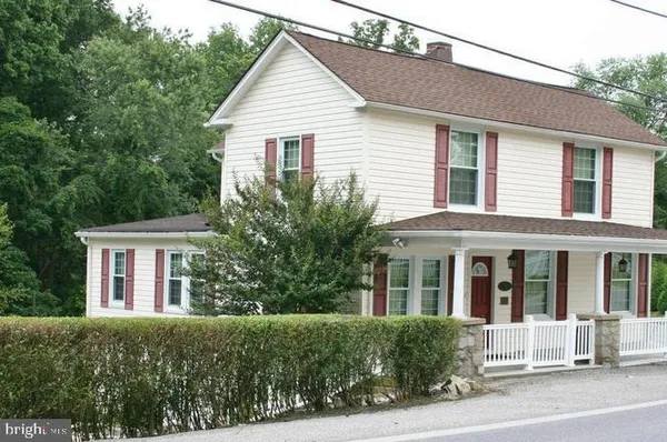 front view of a house and a yard