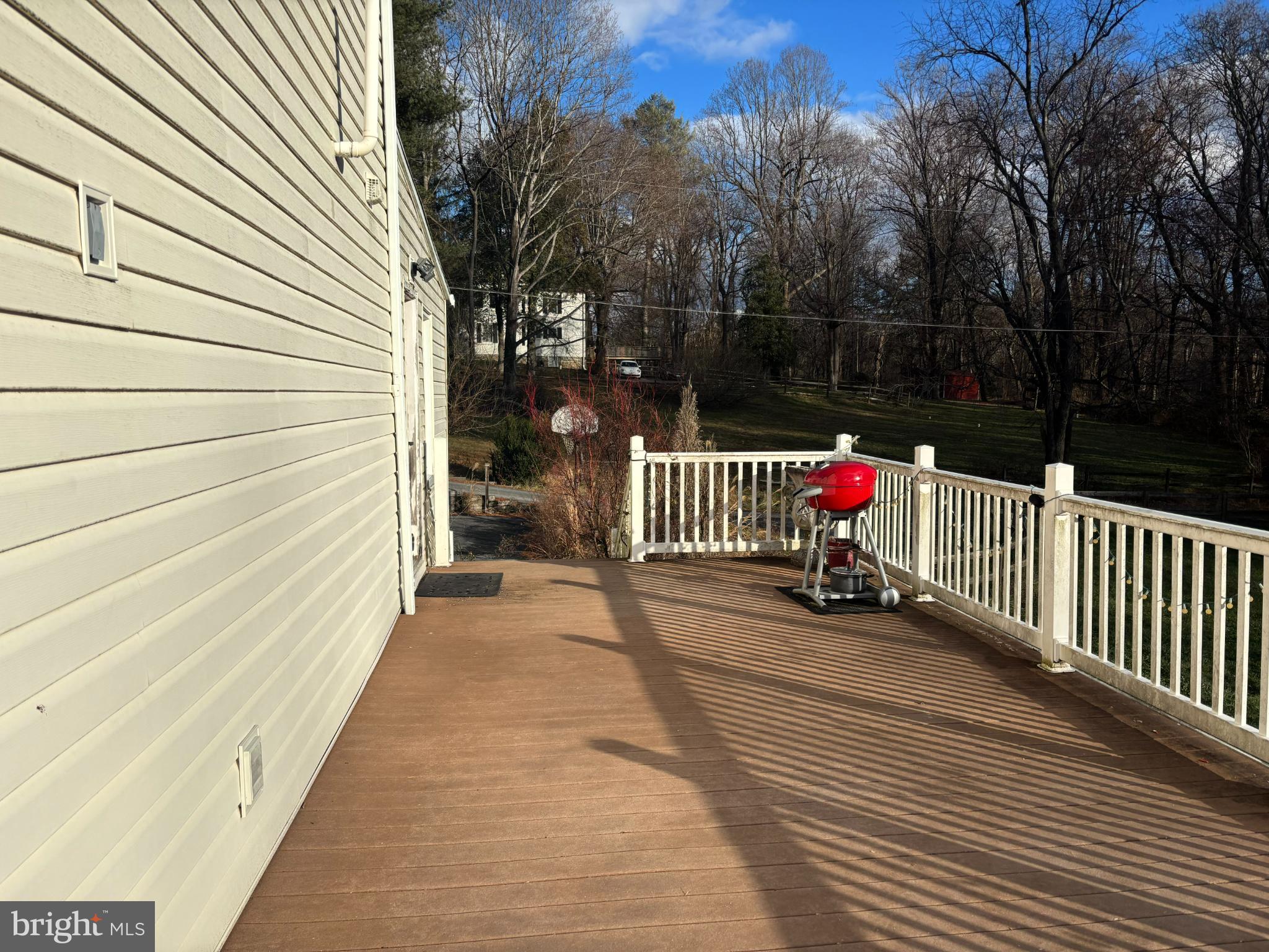 10529 Old Court Road Woodstock, MD 21163 - Photo 3 of 4 Sunny deck with grill and serene views.