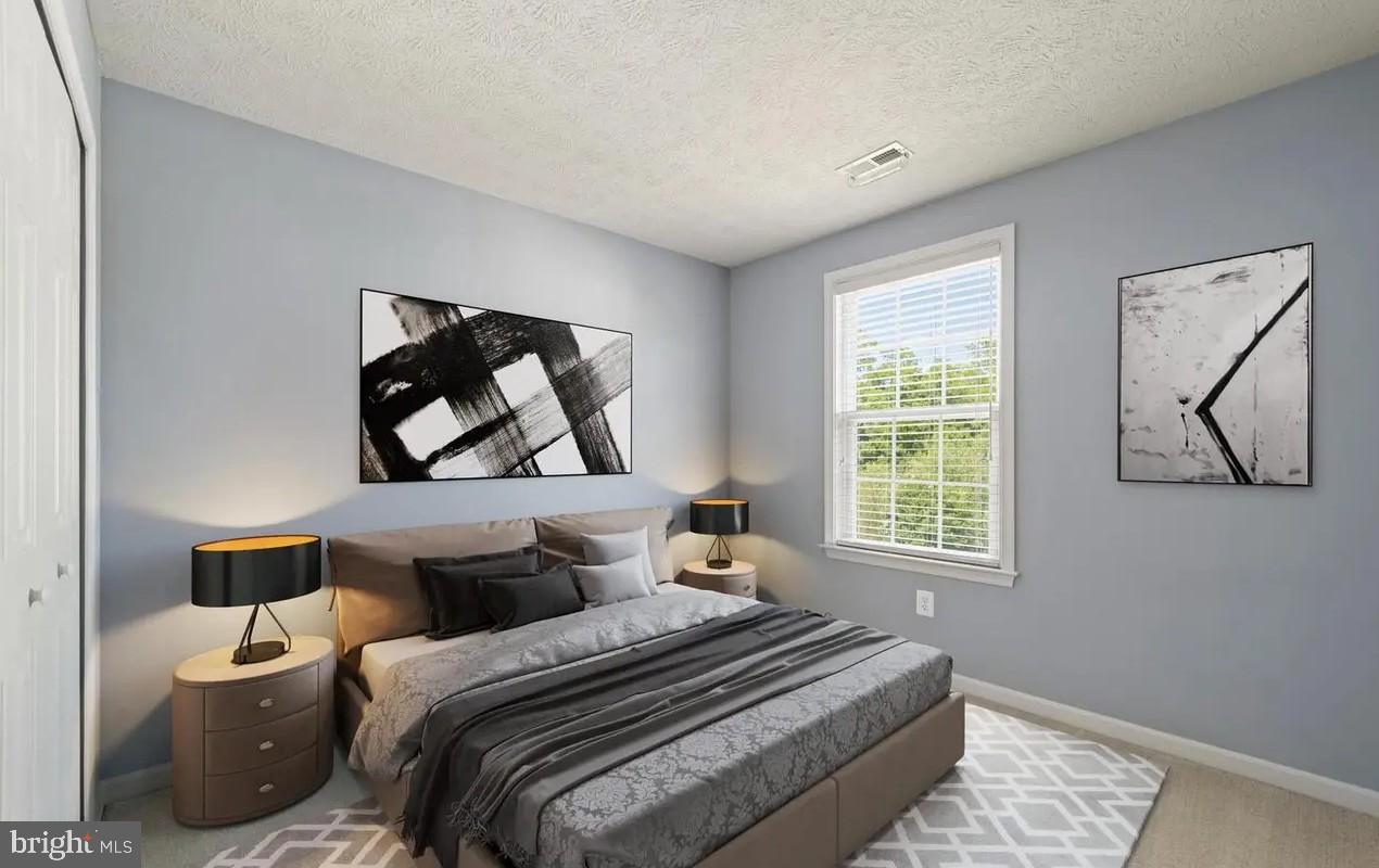114 Compass Cove Stafford, VA 22554 - Photo 13 of 15 a bedroom with bed and a window