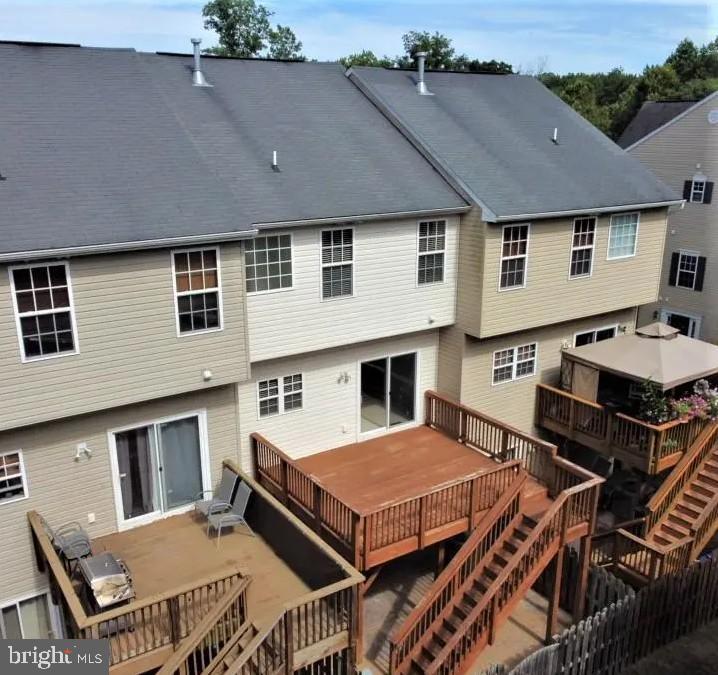 114 Compass Cove Stafford, VA 22554 - Photo 14 of 15 a aerial view of a house with roof deck front of house