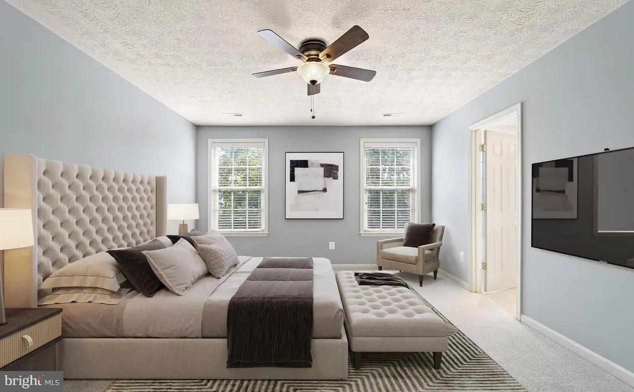 114 Compass Cove Stafford, VA 22554 - Photo 10 of 15 a bedroom with a bed and wooden floor