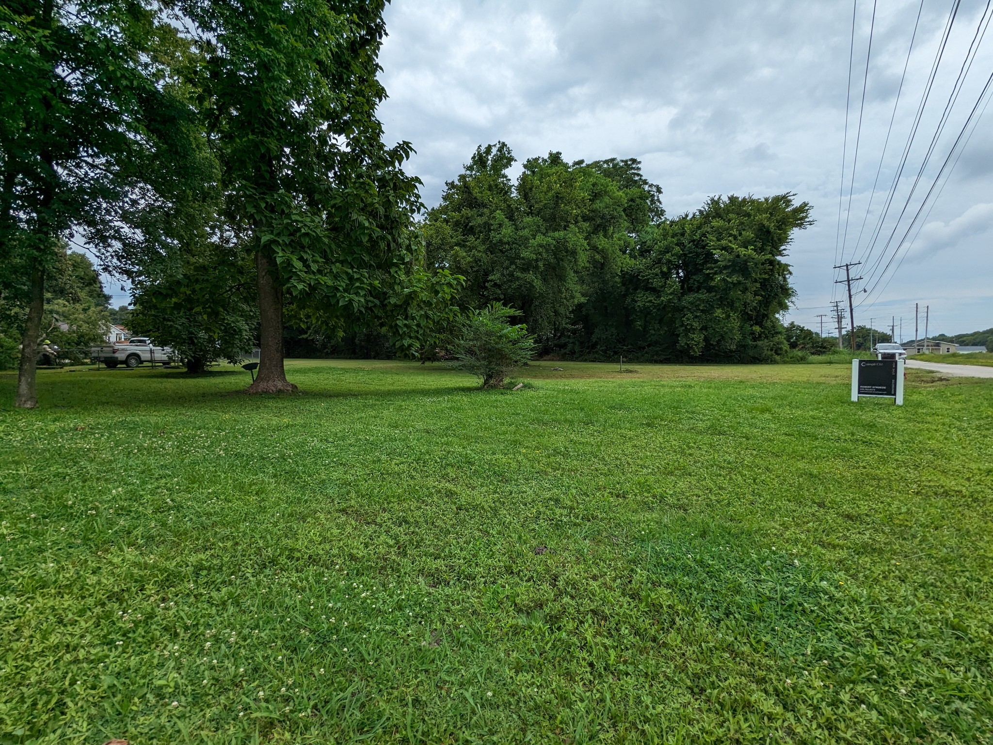 214 Boswell Street Mount Pleasant, TN 38474 - Photo 5 of 6 a view of a park with large trees
