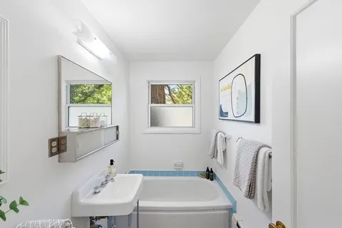 a bathroom with a sink and a bathtub