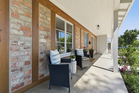 a view of porch with seating space