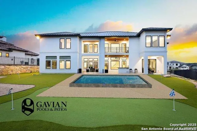 a view of an entryway with wooden floor and a livingroom