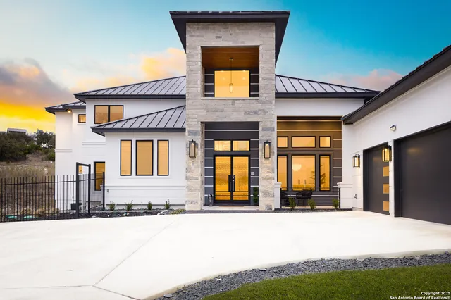 a dining room with furniture a rug and wooden floor