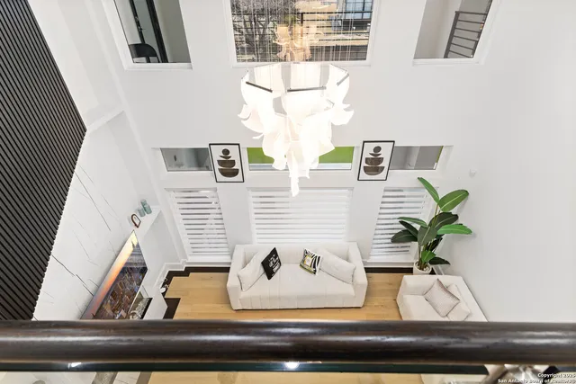 a spacious bedroom with a large bed and a dresser