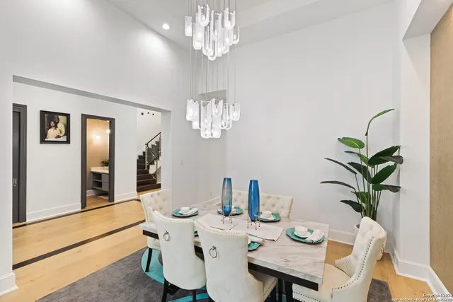 a bathroom with a double vanity sink and shower