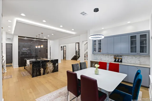 a bathroom with a toilet sink and shower