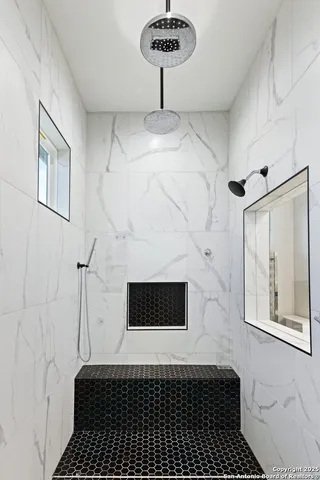 an aerial view of houses with yard