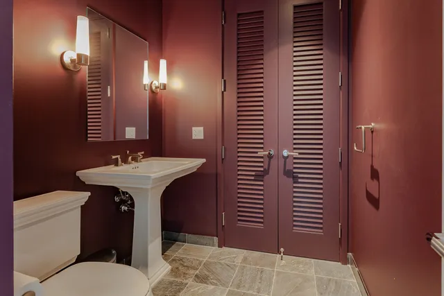 a bathroom with a sink and a toilet