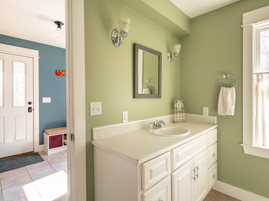 37 Robbins Road Hope, ME 04847 - Photo 19 of 22 Rear entry door into tiled mudroom...