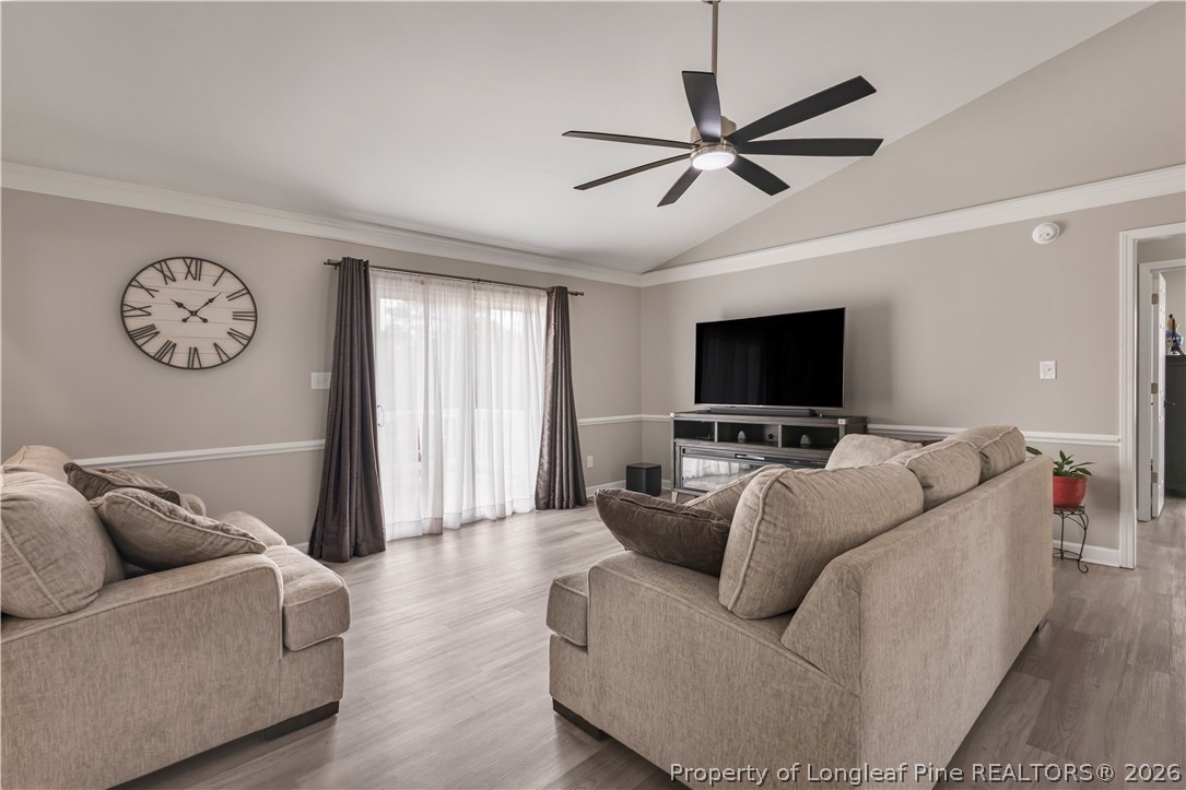 253 Farmstead Court Rockingham, NC 28379 - Photo 10 of 25 a living room with furniture and a flat screen tv
