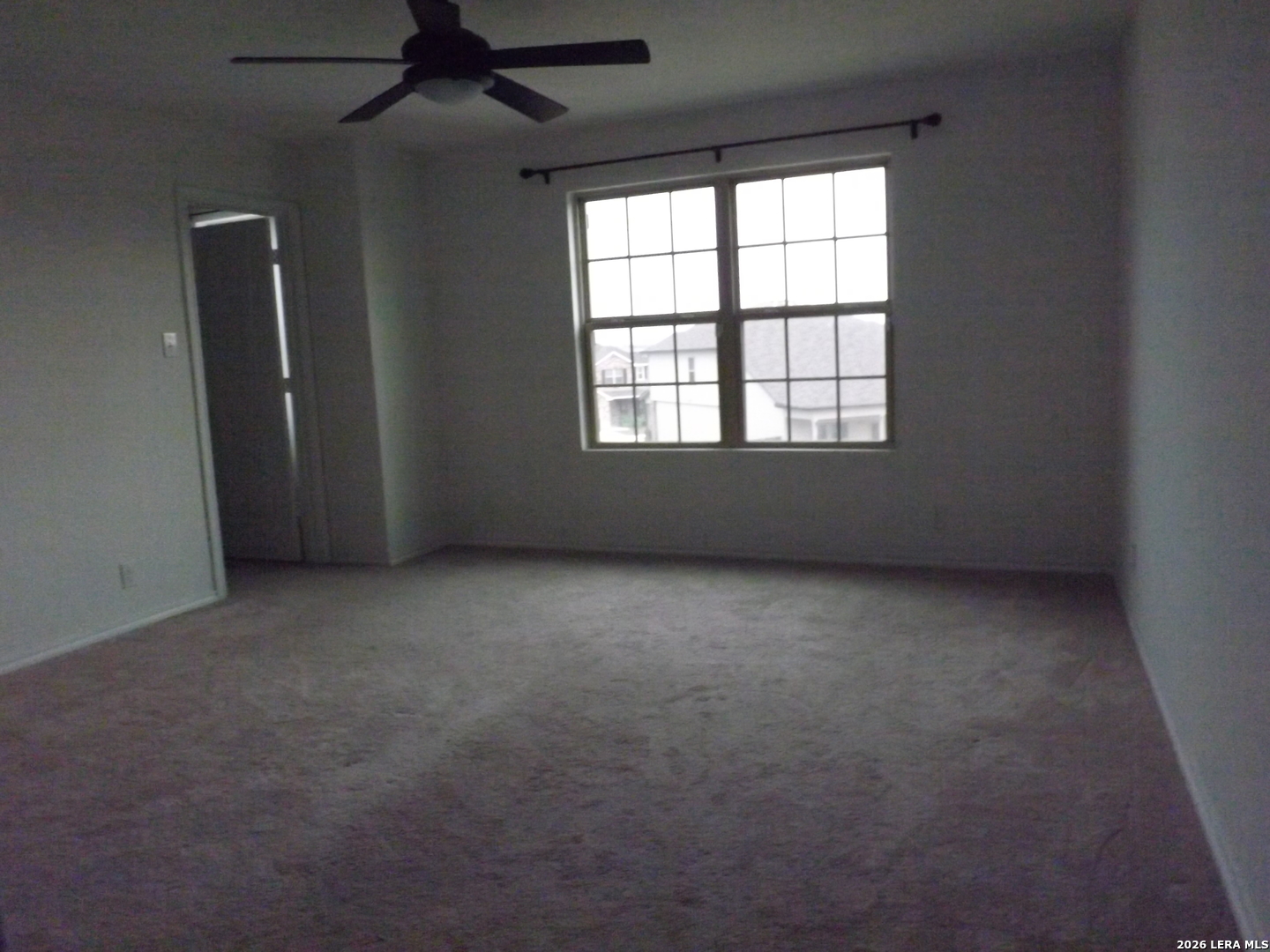 6835 Alaskan Wy. Converse, TX 78109 - Photo 10 of 22 an empty room with a empty space and windows