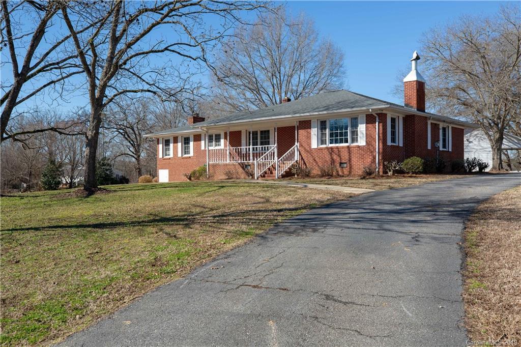 3780 Sawmill Road Hickory Grove, SC 29717 - Photo 1 of 35 a front view of a house with a yard