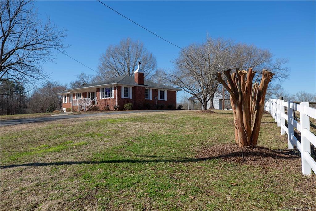 3780 Sawmill Road Hickory Grove, SC 29717 - Photo 2 of 35 a front view of a house with a yard