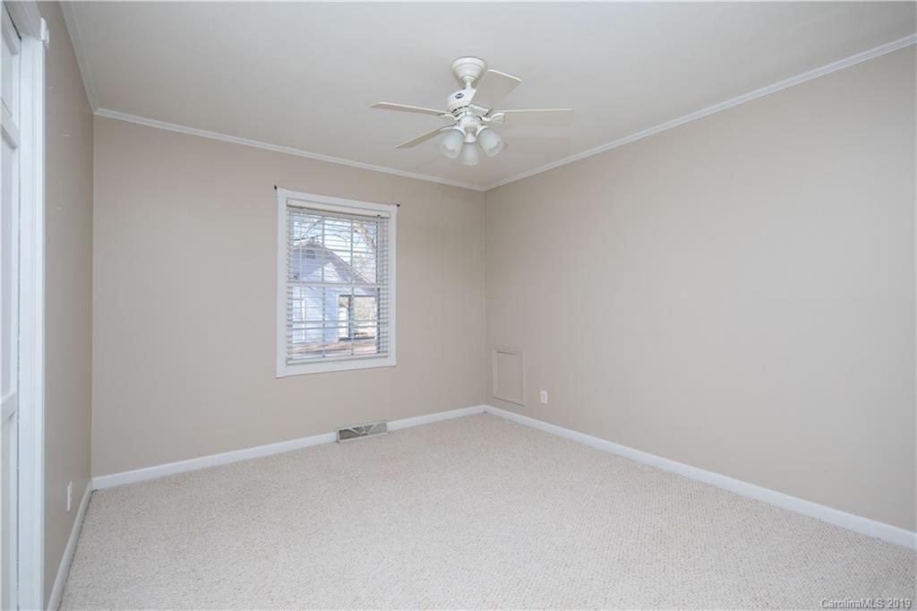 3780 Sawmill Road Hickory Grove, SC 29717 - Photo 23 of 35 an empty room with a window and a fan