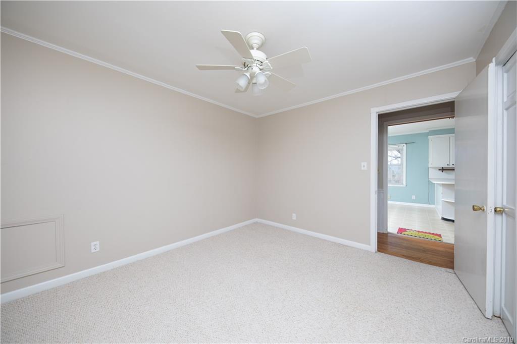 3780 Sawmill Road Hickory Grove, SC 29717 - Photo 24 of 35 wooden floor in an empty room and a bathroom
