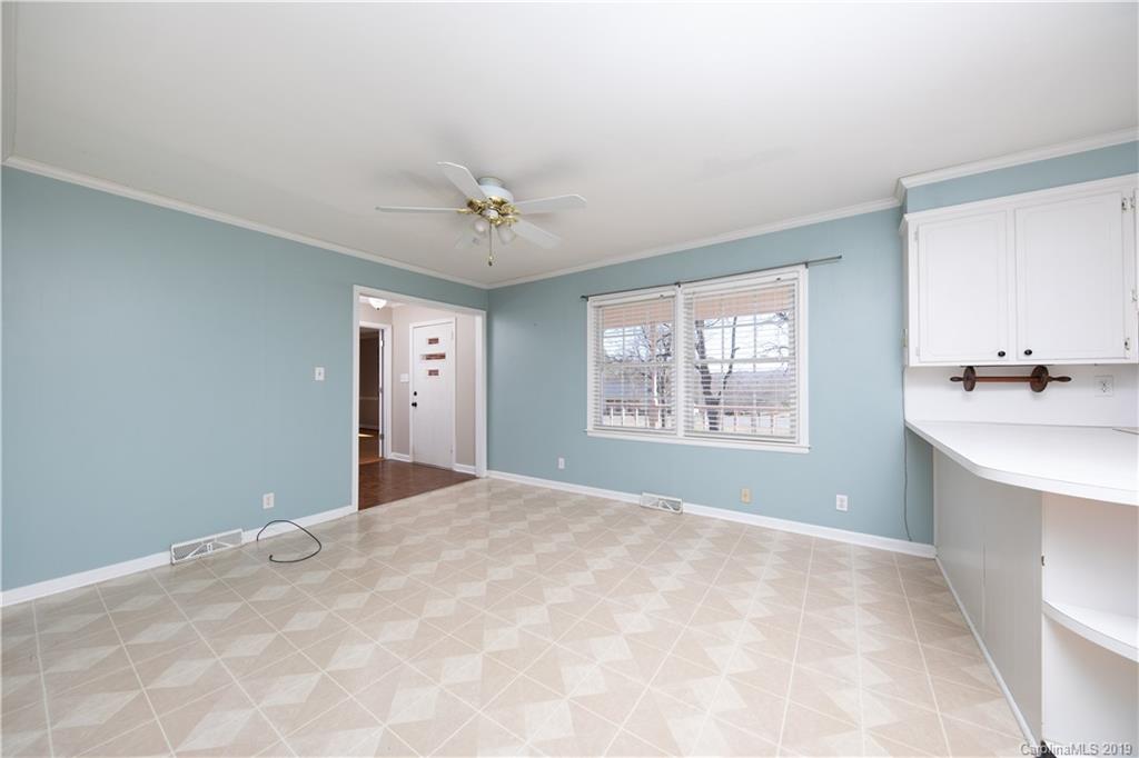 3780 Sawmill Road Hickory Grove, SC 29717 - Photo 28 of 35 a view of a big room with windows and chandelier fan