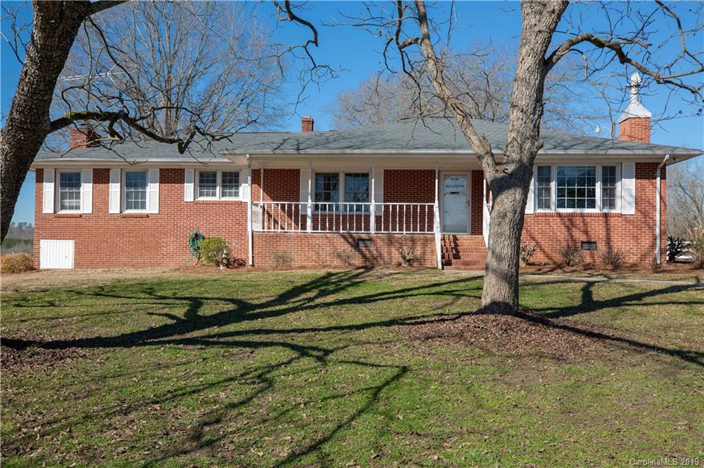 3780 Sawmill Road Hickory Grove, SC 29717 - Photo 4 of 35 a front view of a house with garden